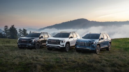 All three trim levels of the 2026 GMC Terrain seen from front quarter angles