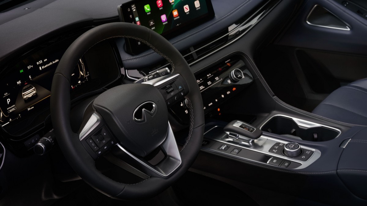 The blue-and-black interior of the 2026 Infiniti QX60 Sport