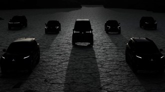 A teaser photo showing silhouettes of planned future Mitsubishi vehicles