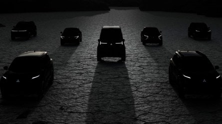 A teaser photo showing silhouettes of planned future Mitsubishi vehicles
