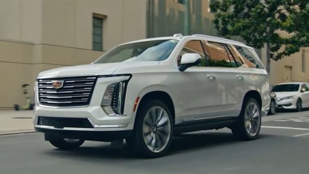 2025 Cadillac Escalade driving through the city.