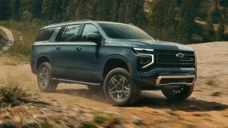 2025 Chevrolet Suburban driving off road.