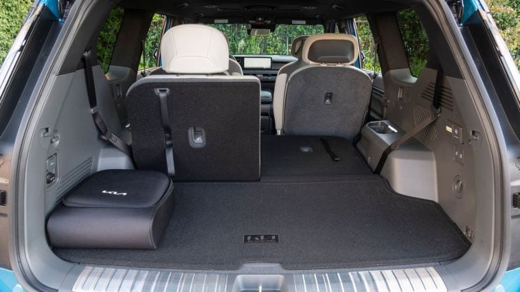 2025 Kia EV9 rear cargo area with seat folded.